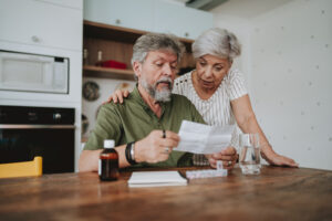 An older couple discusses annuities Peoria IL