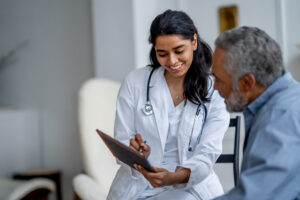 A man meets with one of his Medicare Providers in Morton IL