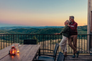 A couple who explored annuities Morton IL residents use for retirement income planning enjoy a vacation in the mountains