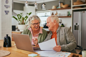 Medicare Assistance Morton IL 1 A couple reviews paperwork after receiving Medicare Assistance Morton IL seniors trust