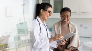 A woman checks in with her doctor after contacting StAK Insurance, one of the top Insurance Agencies Morton IL has to offer